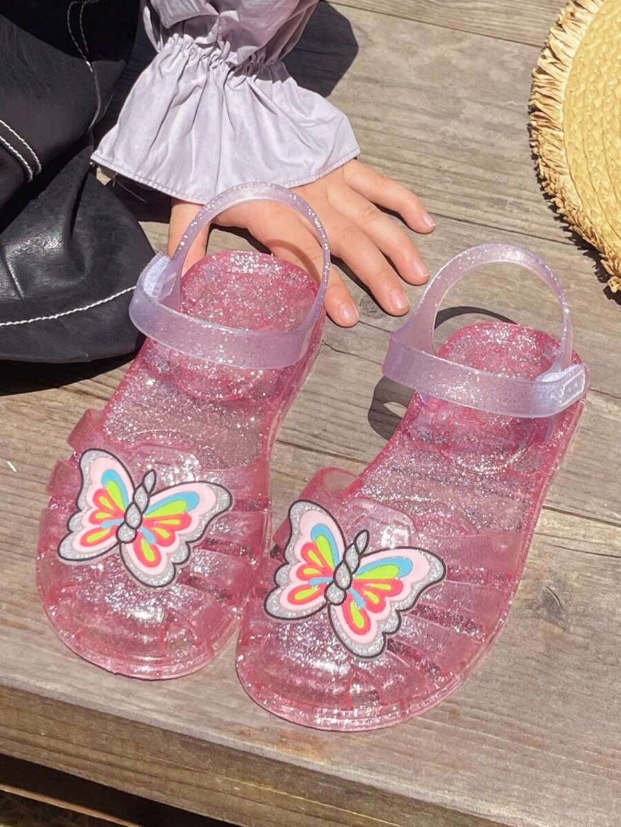 可爱幼儿包头沙滩凉鞋，女童水晶公主镂空果冻鞋，带卡通蝴蝶装饰，夏季儿童透气穿孔鞋