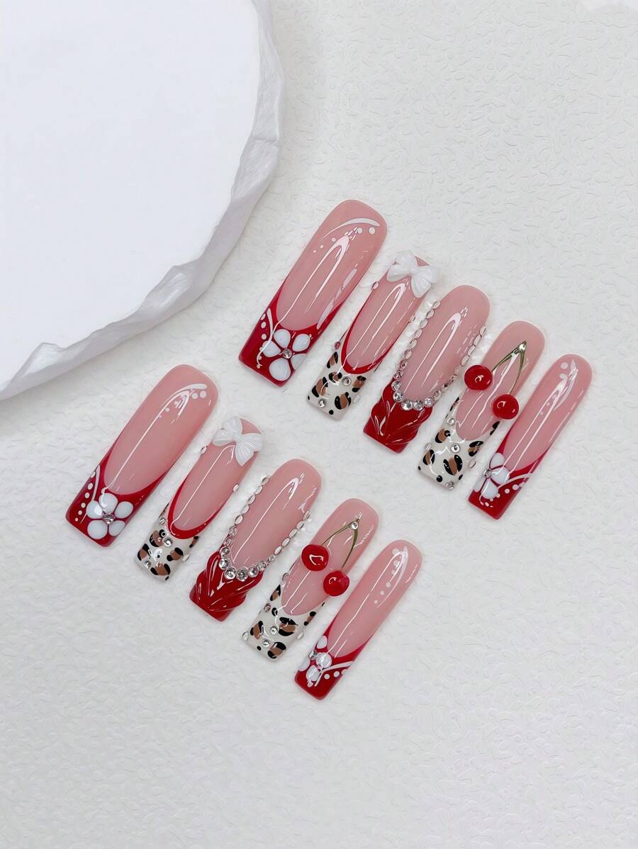 Set van 10 lange nagels in Y2K French Style, met de hand gemaakt en met een luipaardprint, een witte French Tip en een handgetekende 3D-kers, een handgetekende witte bloem en een wit strikontwerp voor nail art, ideaal voor feestjes en dagelijks gebruik. Inclusief gereedschapsset (1 gelei en 1 nagelvijl). Geweldig als cadeau voor vrouwen en meisjes. Nagelbenodigdheden. - Veel kleurig - Bekijken 1