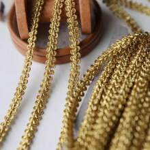 5 Meter goldener welliger Spitzentrimm, 1cm breit, Bekleidungs-Dekorationszubehör