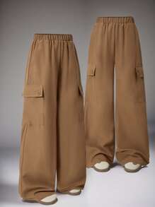 Pantalon décontracté à la mode, lâche et simple, de couleur marron, à jambe droite, convenant aux préadolescentes. Conception à plusieurs poches. Convient pour le printemps et l'automne. Vêtements quotidiens, de plein air, de fête et de campus