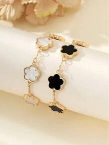 Set de 2 pulseras con diseño clásico de trébol en blanco y negro de moda