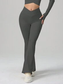 Nieuwe Stijl Eendelige Strakke, Ademende Taille-Cinching En Billen-Liftende Yoga Oefening Jumpsuit Voor Vrouwen Met Uitlopende Lange Broek Geschikt Om Buiten Te Dragen Hardlopen Oefeningen En Fitnesstraining Lente En Herfst Stijl Effen Kleur