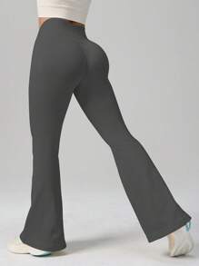 Nieuwe Stijl Eendelige Strakke, Ademende Taille-Cinching En Billen-Liftende Yoga Oefening Jumpsuit Voor Vrouwen Met Uitlopende Lange Broek Geschikt Om Buiten Te Dragen Hardlopen Oefeningen En Fitnesstraining Lente En Herfst Stijl Effen Kleur