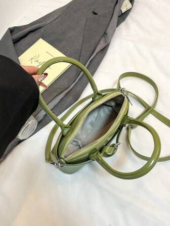 时尚设计女士手提包2024新款简约时尚单肩包，个性化通勤斜挎包