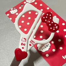 Sanrio 1 pieza Tijeras de estudiante con diseño de gato KT lindo y en forma de mariposa con mango de plástico, con empaque con forma de corazón