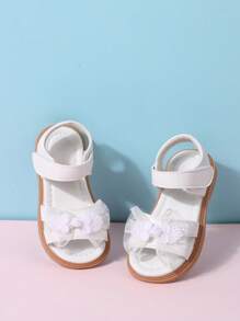 Sandalias planas de encaje para niñas del verano 2025, sandalias cómodas antideslizantes con lazo para bebé princesa