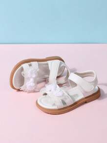 Sandalias planas de encaje para niñas del verano 2025, sandalias cómodas antideslizantes con lazo para bebé princesa