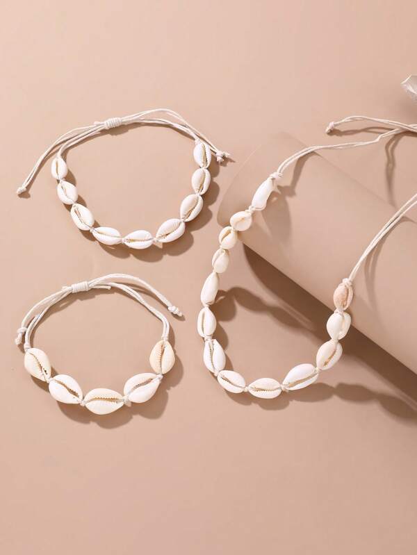 Set de 3 piezas de joyería para niñas con collar, pulsera y tobillera con diseño de conchas