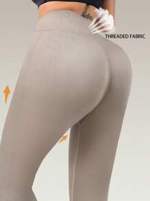 قطعة واحدة من السراويل الرياضية ذات التحكم في البطن والرفع للمؤخرة والنسيج المنسوج العادي عالي المرونة لضبط والتخسيس والبطن المستوي ملابس رياضية نسائية للصالة الرياضية