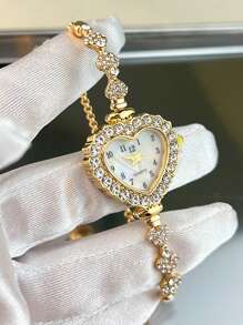1 pièce Montre-bracelet pour femmes en alliage or rose, or et argent avec un boîtier en forme de cœur, un cadran avec chiffres arabes, un mouvement à quartz et un style à cordon ajustable pour un port quotidien