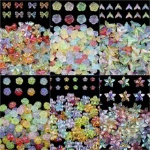 100 piezas de cuentas perforadas de material de resina de 24mm con formas mixtas al azar de rosas de colores, colas de pez, mariposas y flores, adecuadas para hacer artesanalmente pulseras, collares, pendientes, accesorios de moda, decoración de ropa y suministros para la fabricación de joyas