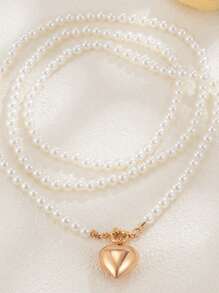 1 pieza Collar multicapa con colgante de corazón hueco de perla, gargantilla versátil