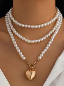 1 pieza Collar multicapa con colgante de corazón hueco de perla, gargantilla versátil