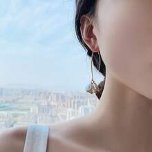 1 paire de boucles d'oreilles élégantes à perles acryliques, style simple et chic pour femmes, à porter au quotidien et en soirée. Accessoire polyvalent toutes saisons.