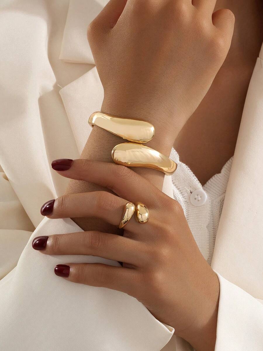 Set de 1 pulsera de metal con forma geométrica y 1 anillo de metal