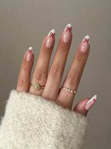 24片中号杏仁形美甲贴片，白色法式尖头，饰有可爱蝴蝶结，优雅可爱，是送给女孩和女士的绝佳情人节礼物。 - 彩色 - 查看 1