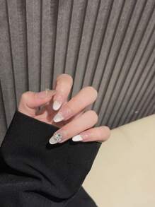 Accesorios para uñas: Nuevo diseño de primavera con ojos de gato, perlas, lazos y piedras preciosas. Uñas postizas de estilo adhesivo.
