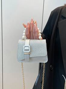 1 款迷你珍珠手提包 PU 材质时尚、实用、简约。适合女孩在聚会、购物和旅行时使用。高品质外观，与衣服、拉链相配，可作为节日或生日礼物赠送给家人和朋友。