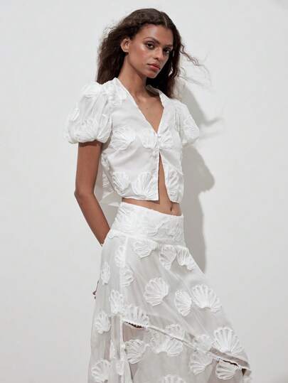 Cardigan romântico com mangas curtas e jacquard e concha