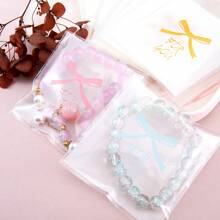 50Pcs Sweet Bowknot Picture Self-Adhesive Bag Bottle Mouth Plastic Packaging Bag Suitable For DIY Jewelry Crafts Display And Storage Packaging Storage Bag Gift Transparent Packaging Display Bag - Opp Bag - View 3
