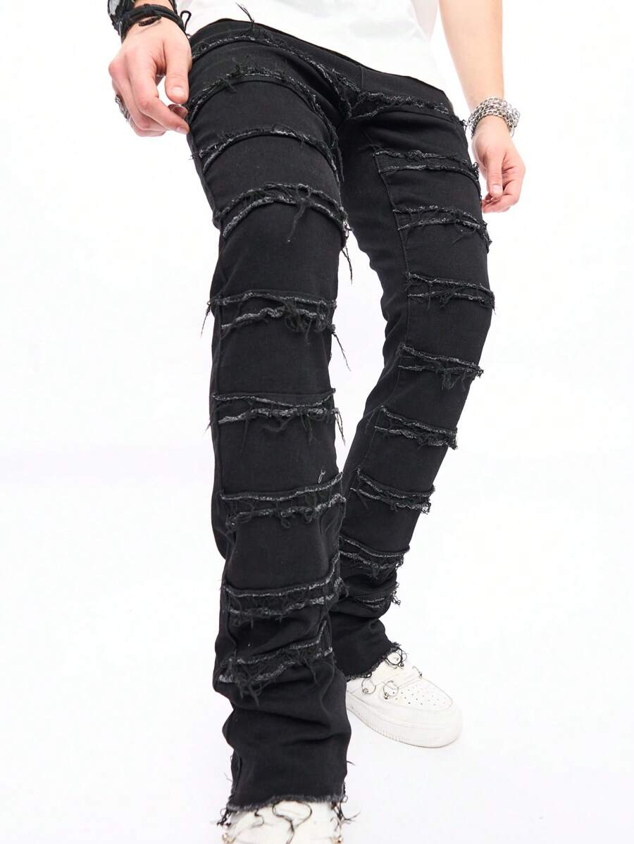 男式破洞牛仔裤，带磨边、流苏装饰、休闲嘻哈设计