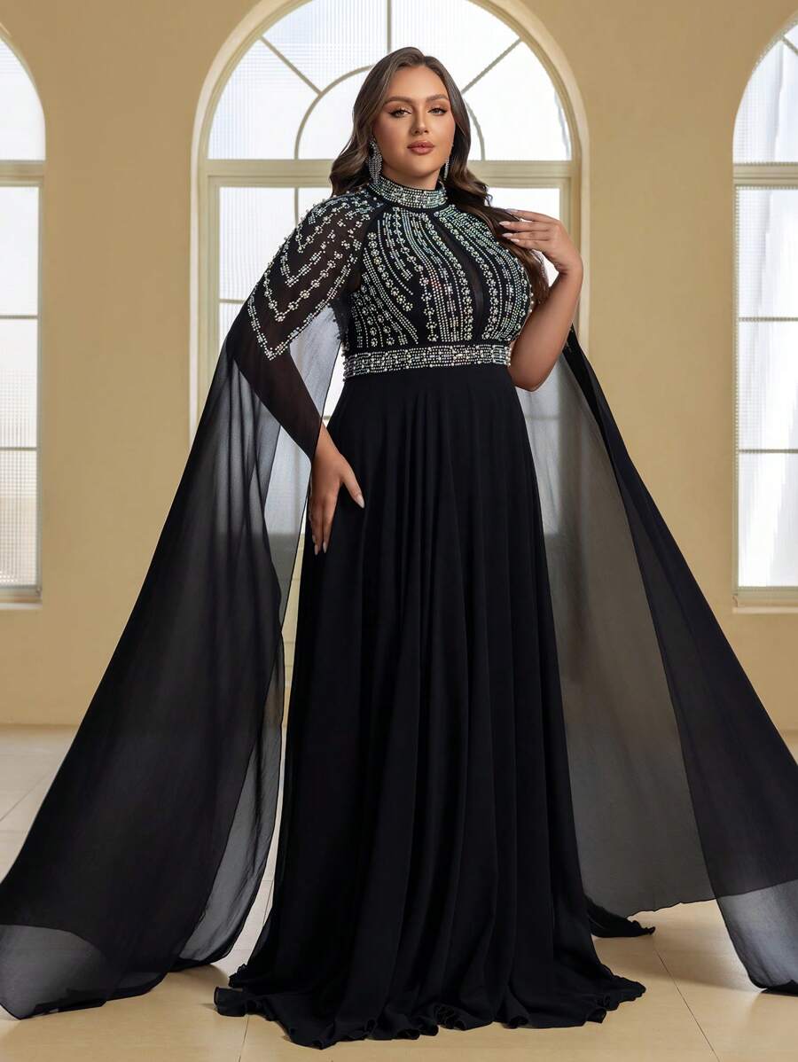 Đầm dạ hội sang trọng, quý phái dành cho nữ, chất liệu chiffon đính pha lê, cổ cao, tay áo choàng, thích hợp cho các buổi dạ tiệc, sự kiện trang trọng và tiệc cưới.