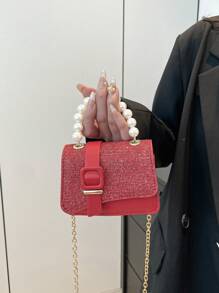 1 款迷你珍珠手提包 PU 材质时尚、实用、简约。适合女孩在聚会、购物和旅行时使用。高品质外观，与衣服、拉链相配，可作为节日或生日礼物赠送给家人和朋友。