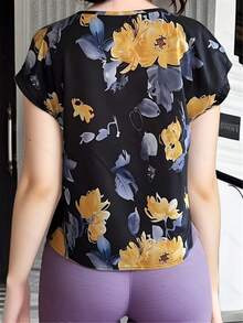 女士花卉印花休闲圆领衬衫，适合假期穿着