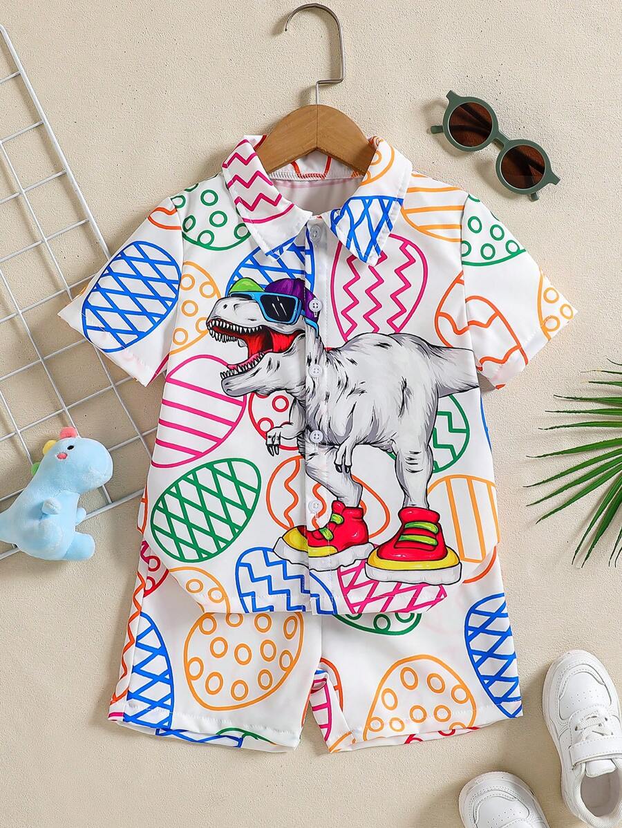 2pcs Young Boy Cartoon Dinosaur & Easter Egg Print Lapel Button-Front Short Sleeve Shirt + Shorts Set, Fashionable Outfit For Casual, Outdoor, Easter Party, Spring/Summer