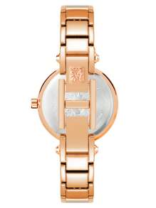 Anne Klein ساعة سوار ذهبية وردية اللون بحجر كوارتز للنساء، ساعة فاخرة مرصعة بالماس مع قرص من صدف اللؤلؤ الوردي الفاتح، ساعة أنيقة للاستخدام اليومي، هدية ساعة أنيقة للسيدات، AK/1980BMRG