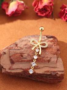 A Bow Shaped Micro Inlaid Copper Navel Nail
