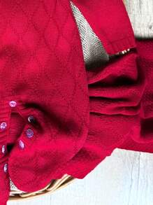 Saída de maternidade vermelha em tricô aconchego