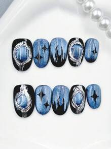 10 pièces d'ongles ovales portables faits à la main, conçus dans un style contrastant bleu foncé multicolore, avec des motifs d'yeux de chat de luxe légers et de flammes, convenant à l'utilisation quotidienne par les femmes de différents styles, et pouvant être offerts en cadeau