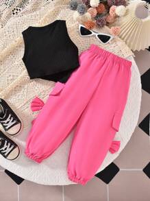 Set de 2 piezas para niñas que incluye una camiseta con estampado de letras "MAMA'GIRL" y pantalones cargo con decoración de lazo