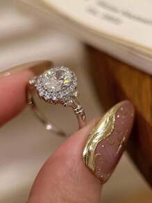 1入不鏽鋼時尚簡約通用高端精致創意四爪鑲鑽戒指，具有奢華和獨特感，適合女性訂婚/結婚戒指的理想選擇