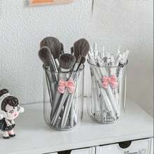 1个蝴蝶结装饰化妆品收纳盒，大容量整理盒，可收纳化妆刷、桌面物品、浴室用品和卧室配件，适合度假、海滩、浴室、卧室等场合。 - 彩色 - 查看 5