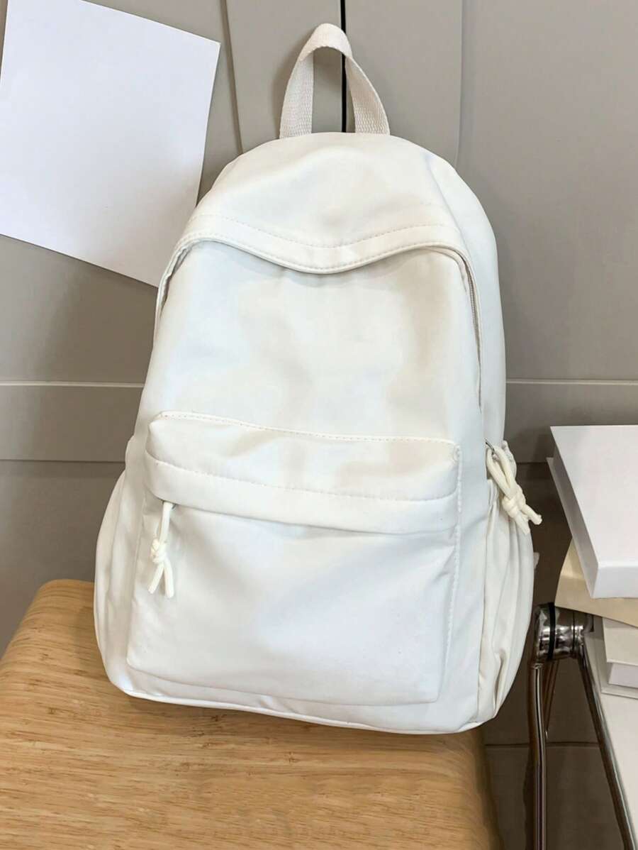 新款纯色尼龙休闲背包,适合学生、上学、旅行及男女通用,也适合户外短途旅行。轻便透气,耐磨防水。背包背面设有拉链口袋。时尚休闲,轻巧百搭,大容量男士背包,是女性、女孩和学生的必备学习用品,可完美搭配各种背包配件,是返校季必备的校园背包,也是大学必备单品。 - 白色 - 查看 1