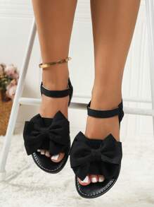 شبشب أنيق للنساء مسطح به زينة فيونكة، بألوان أنيقة وفتحة أصبع القدم مفتوحة، شبشب كاجوال للشاطئ والأنشطة الخارجية