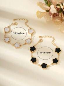 Set de 2 pulseras con diseño clásico de trébol en blanco y negro de moda