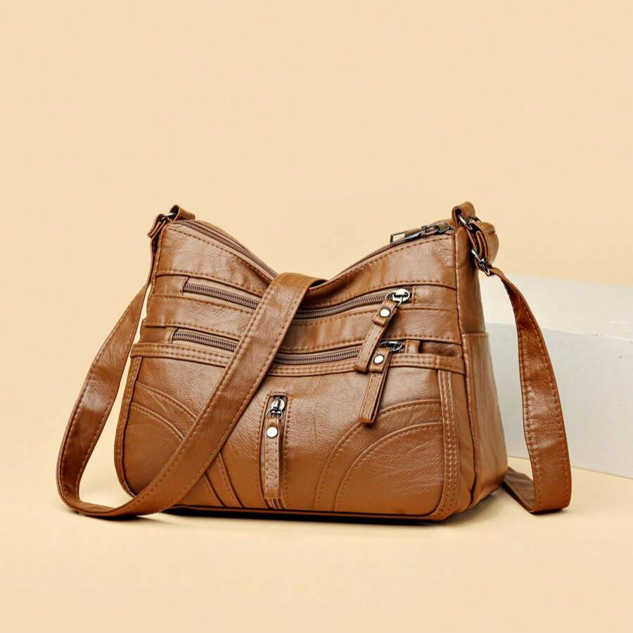 Túi đeo vai nữ dung tích lớn trang trí khóa đỏ, thích hợp cho cuộc sống hàng ngày - màu nâu - Xem 1