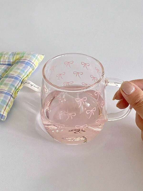 1pc INS Style Bow Print Glass Cup, Asymmetrical Handle Water Mug, Home Afternoon Tea Coffee Cup, Juice Cold Drink Cup, Breakfast Milk Cup, Yogurt Oatmeal Cup, Holiday Gift Cup, Gift For Family And Friends, Valentine's Day Gift Back To School