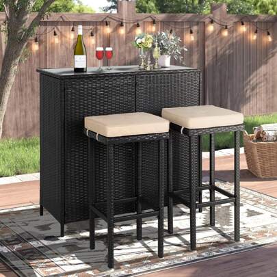 Outdoor Patio 3-Piece PE Wicker Bar Table Set With Storage Shelves And Two Cushioned Stools For Backyards, Lawn, Garden, Deck, Or Poolside