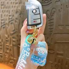 Sanrio 1 bucă breloc pentru sticle de lapte cu desene animate creativ, rafinat și drăguț, care curge lichid, cu pandantiv, accesorii pentru pungi, cadouri mici (personajele din sticlă rămân neschimbate, în timp ce modelele se schimbă aleatoriu)