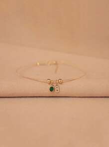 1 pièce Bracelet jonc en argent chanceux avec le caractère chinois "Da Ji" décoré de zircone cubique vert émeraude en argent sterling 925. Polyvalent pour un port quotidien et une soirée, cadeau de luxe unique pour elle, bijoux de créateur