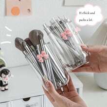 1个蝴蝶结装饰化妆品收纳盒，大容量整理盒，可收纳化妆刷、桌面物品、浴室用品和卧室配件，适合度假、海滩、浴室、卧室等场合。 - 彩色 - 查看 2