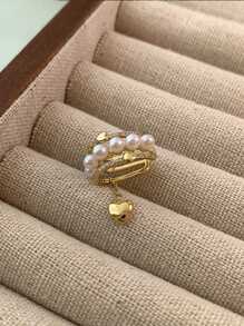 1 pièce pendentif à clip d'oreille en forme de cœur creux à plusieurs couches de perles, en matériau de cuivre de couleur dorée, léger et élégant, convient pour un port quotidien pour les femmes