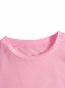 Camiseta de manga corta casual y versátil, con estampado gráfico de conejo de Pascua, en color liso y holgada