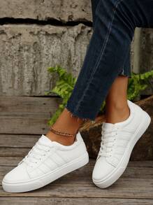 1 par de zapatillas deportivas casuales versátiles para uso diario y al aire libre, con estilo de monopatín, puntera redonda y cordones a rayas, para mujer