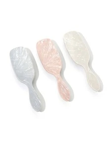 Todos aman este exquisito y de alta gama peine con cámara de aire y patrón de mármol imitación. Es el regalo perfecto para el Día de San Valentín. Tiene función de masaje del cabelludo y se puede usar tanto en el cabello seco como mojado. Puede desenredar el cabello, dejándolo suave y sin nudos. Además, es de tamaño compacto y fácil de llevar.