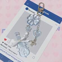 1pc Fashionable And Cute Crystal Mini Violin Keychain, Stylish Accessory For Backpacks And Clothing, Featuring A Mini Cross And Lucky Four-Leaf Clover, Ideal Gift For Women And Girlfriends For Holidays And Festivals